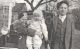 Hansen, Irene holding baby John Clayton Jensen with Howard Hansen